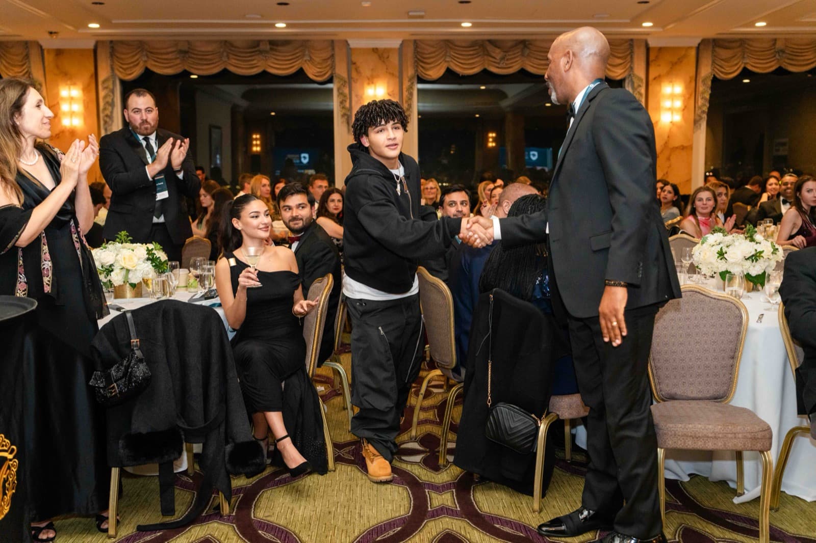 Members at an Aureum sponsor reception