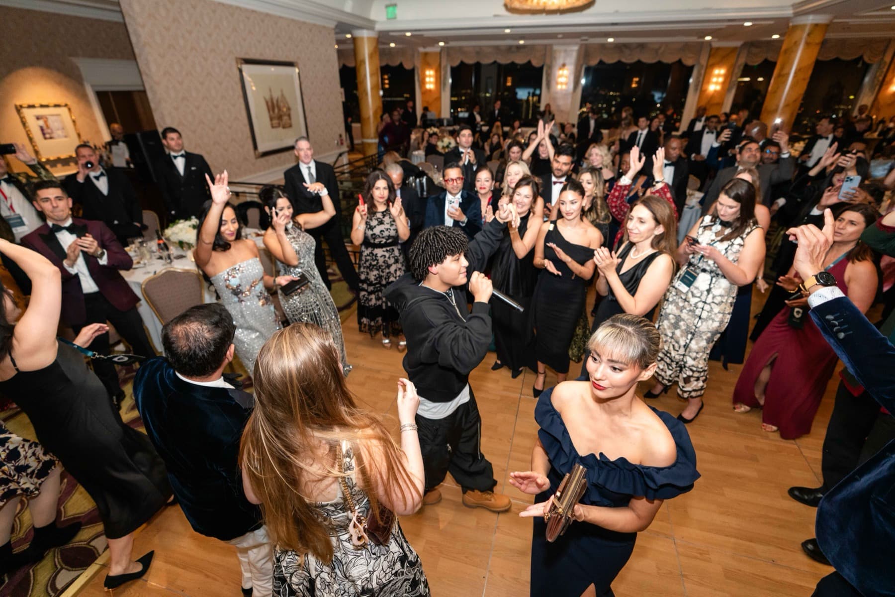 Members celebrating at an Aureum signature gathering