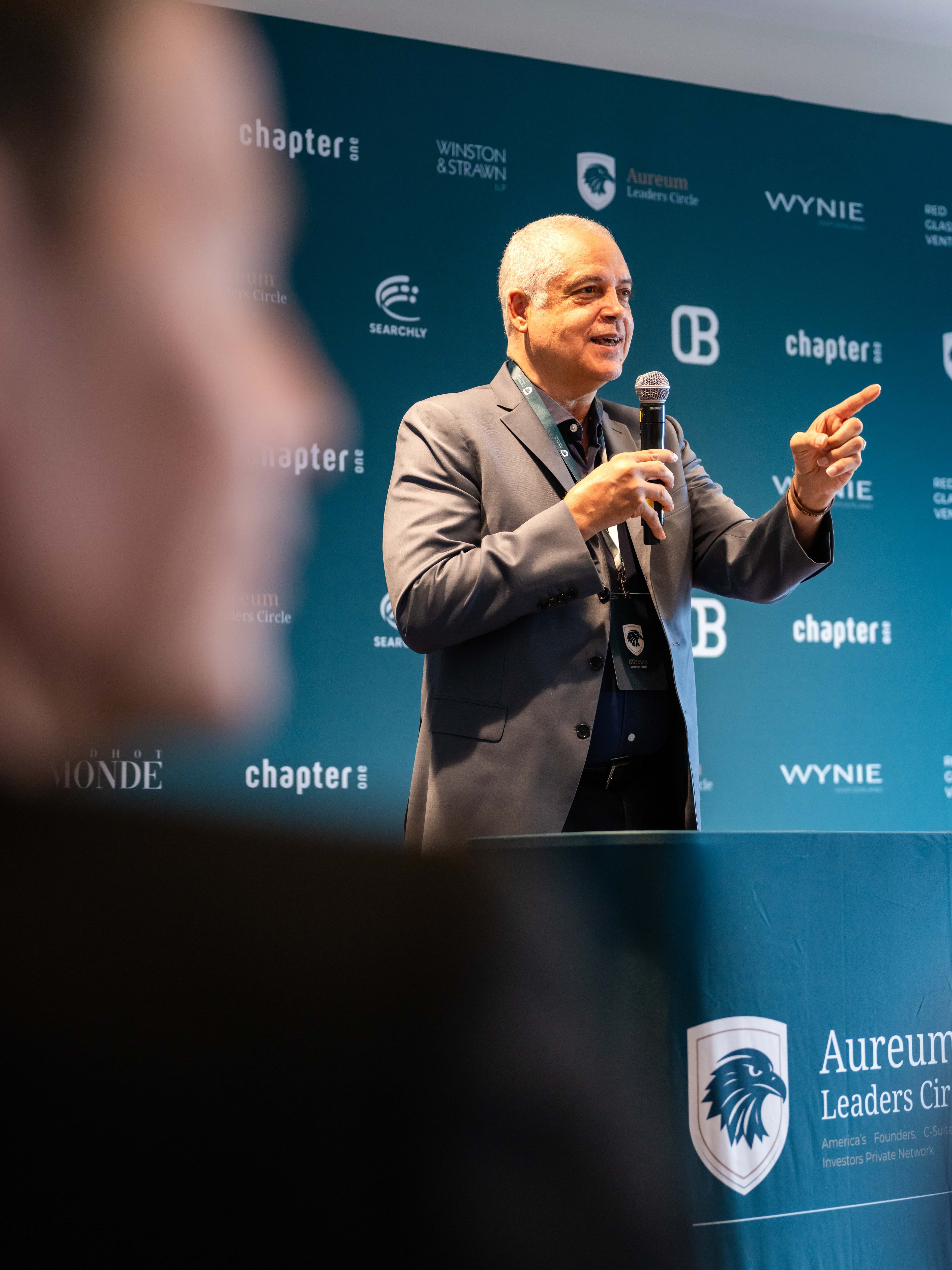 An Aureum founder addressing partners at a Circle event