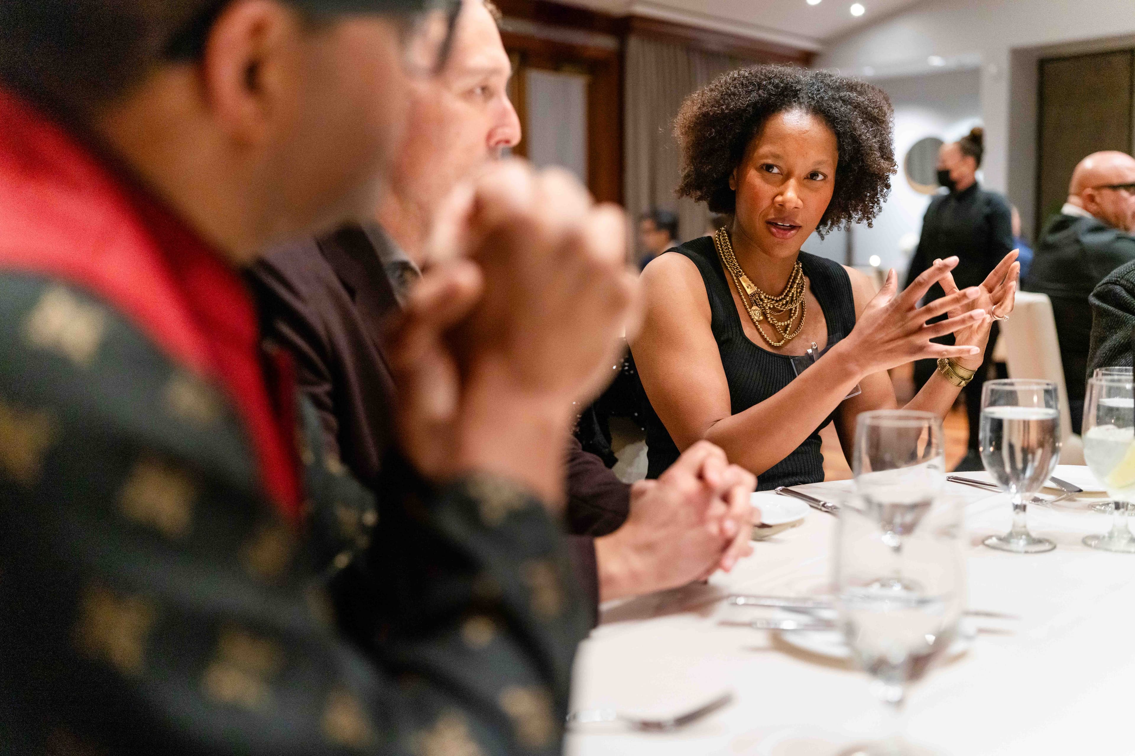 An Aureum member sharing perspective during a partner discussion